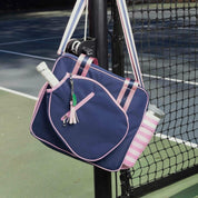 Navy Pink Lola Bag on Fence