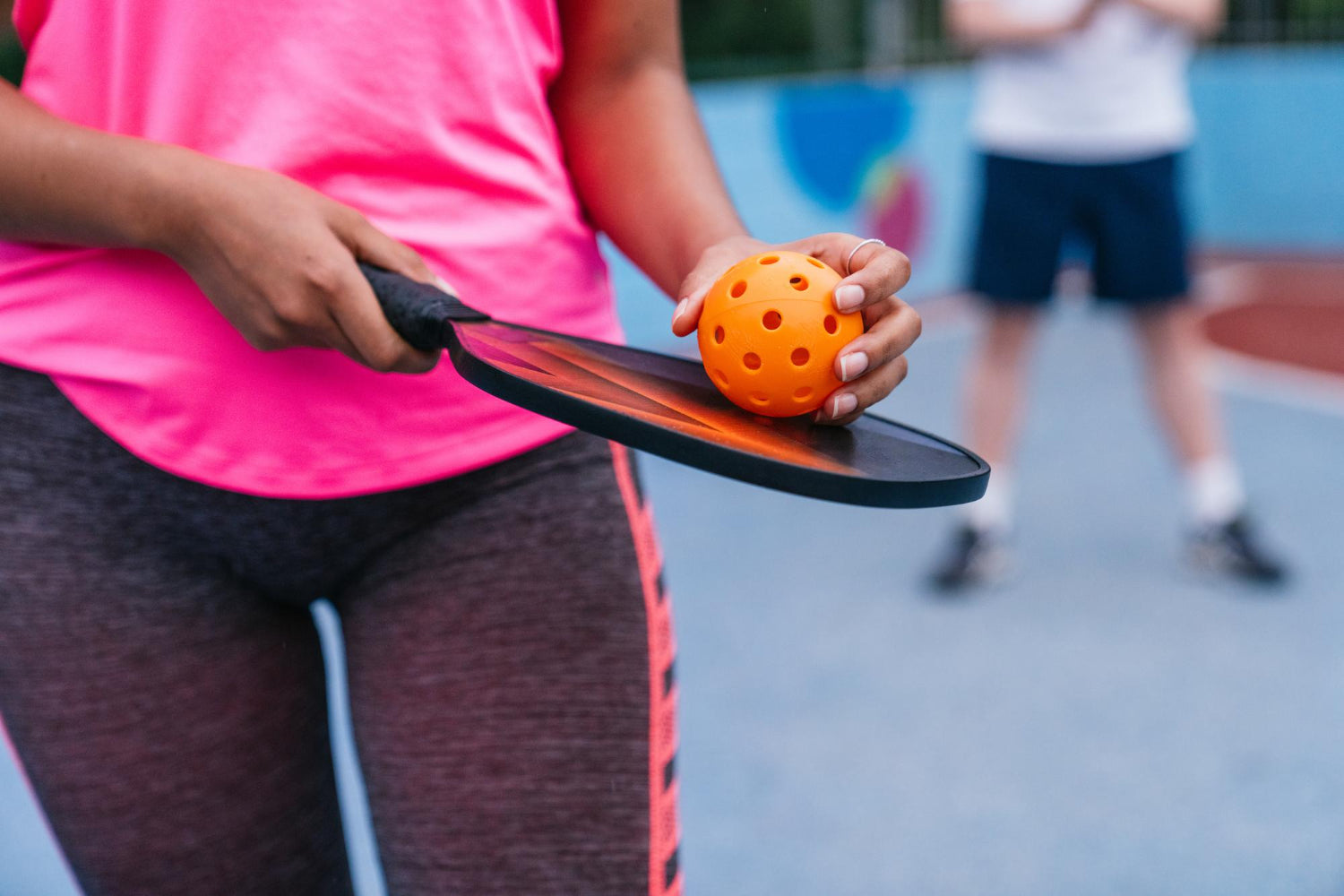 woman playing pickleball