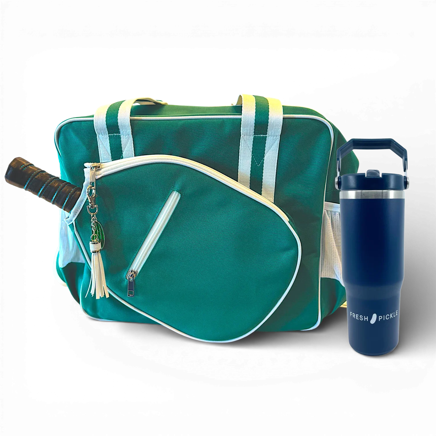 Green and white pickleball bag with paddle in pocket and navy tumbler cup
